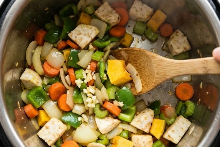 chopped vegetables sautéing in the Instant Pot